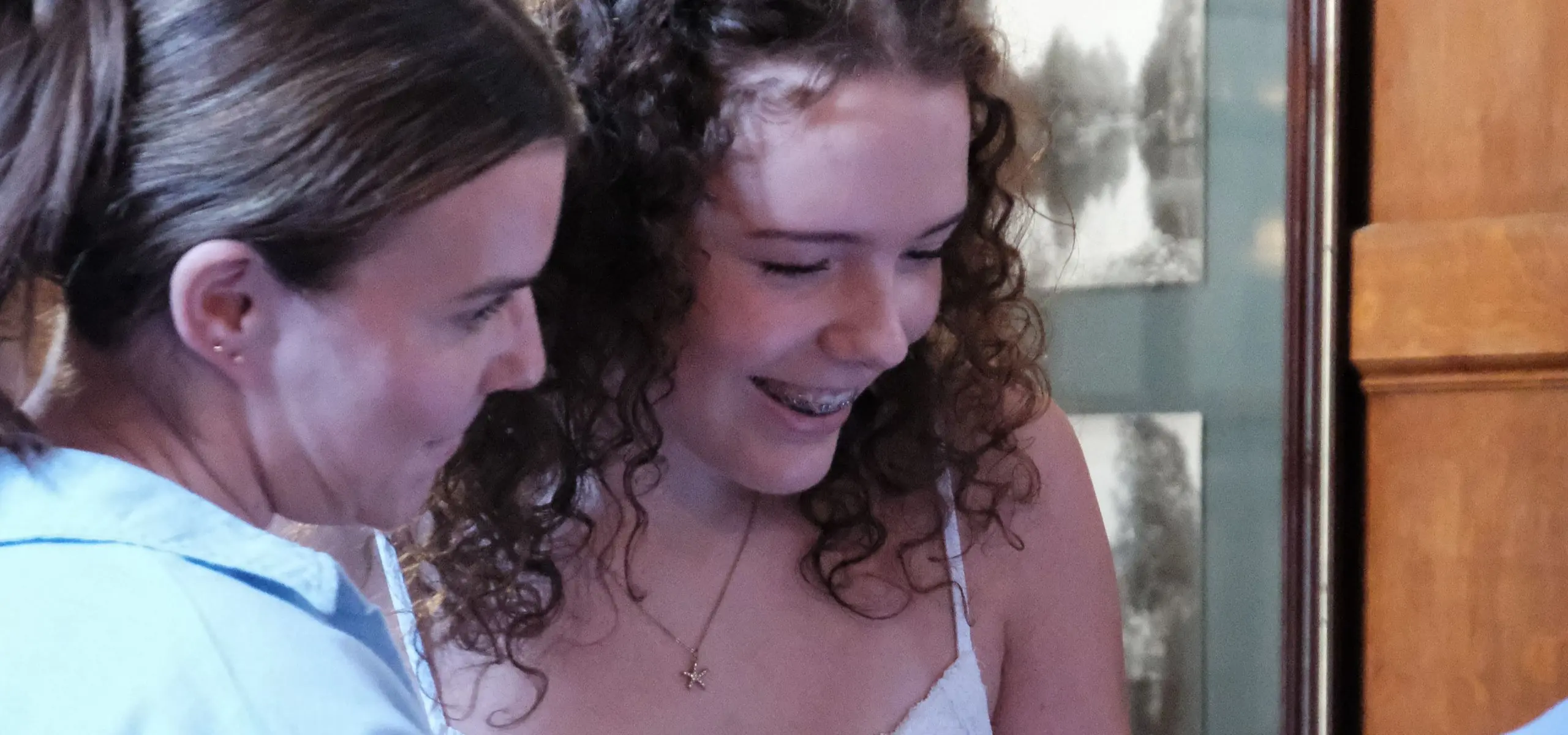 Students looking at results together