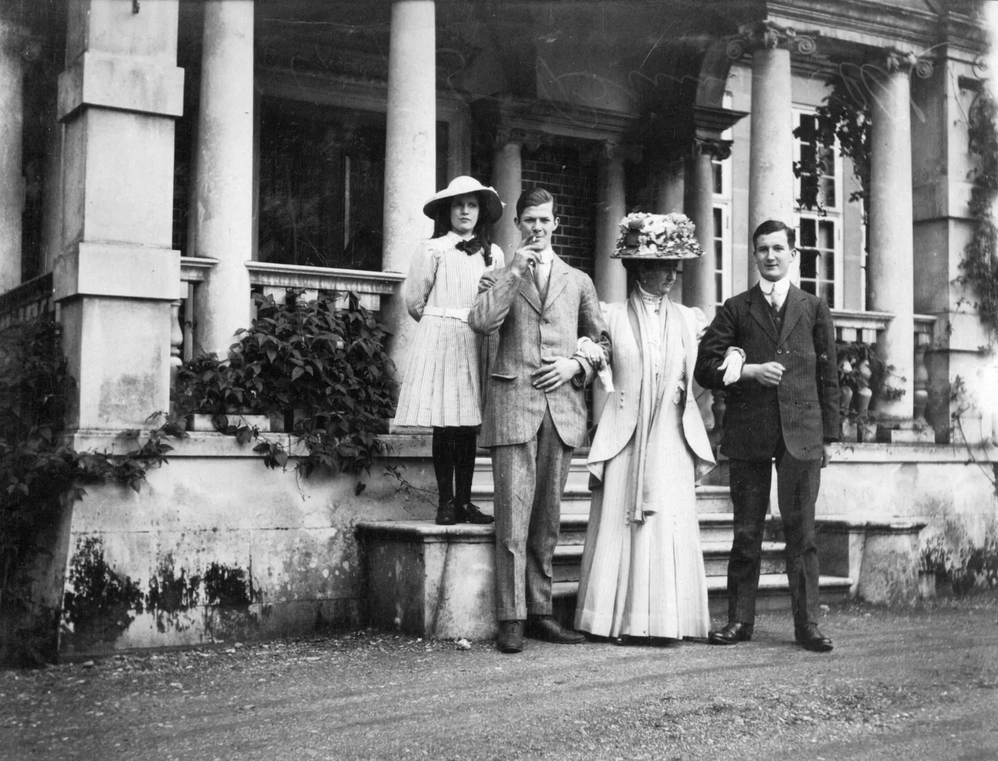 Black and white photo of people standing outside Sherfield