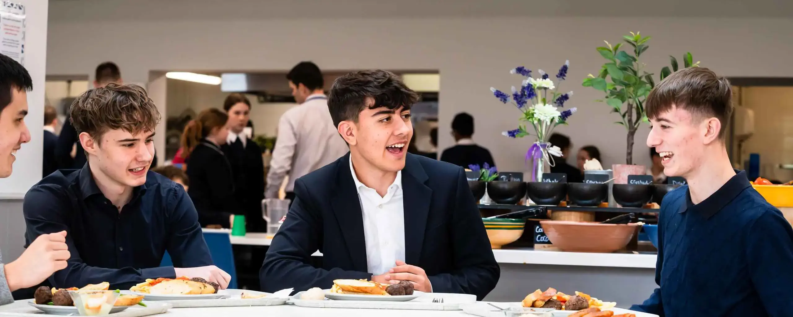 Students laughing in canteen