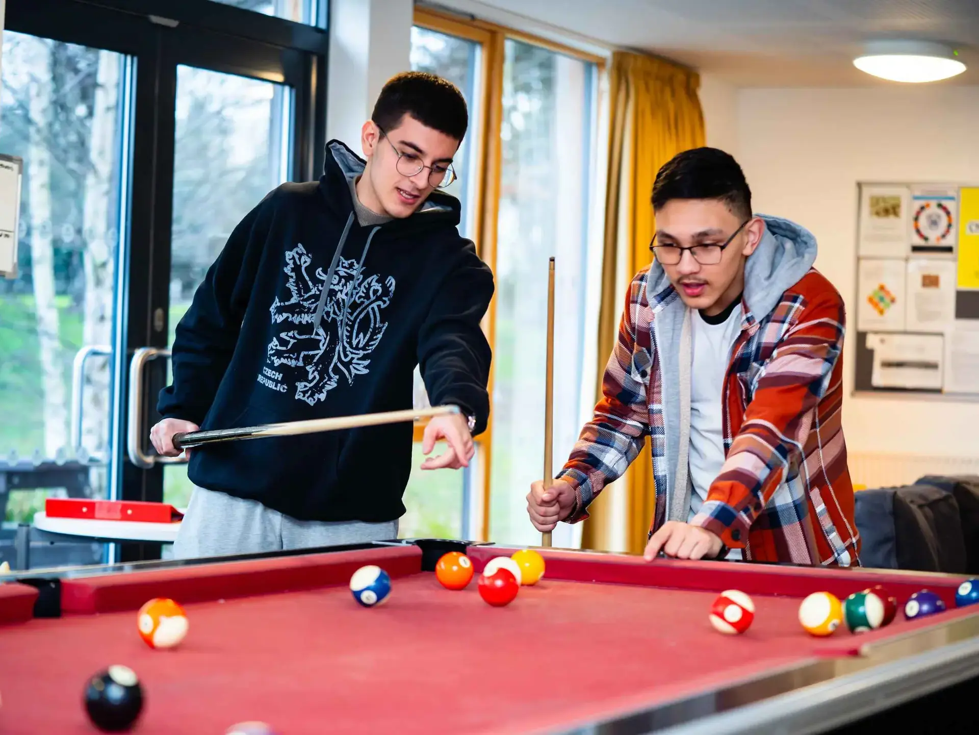 Students playing pool