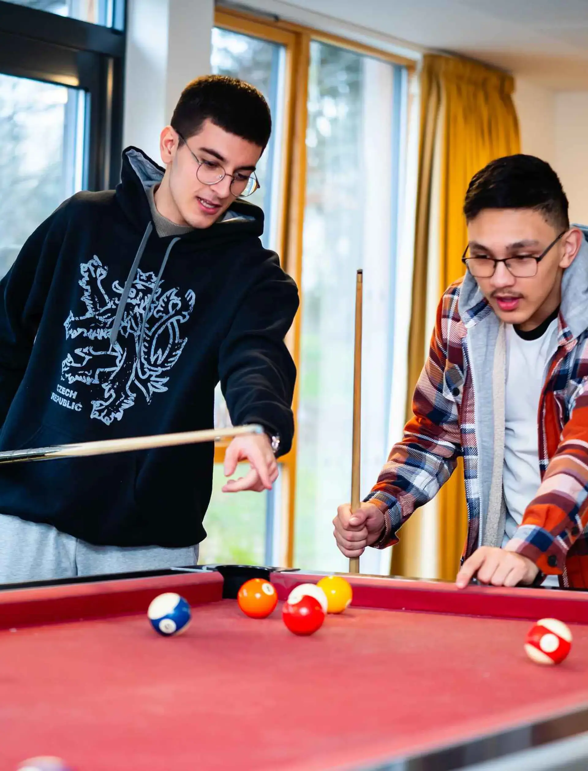 Students playing pool