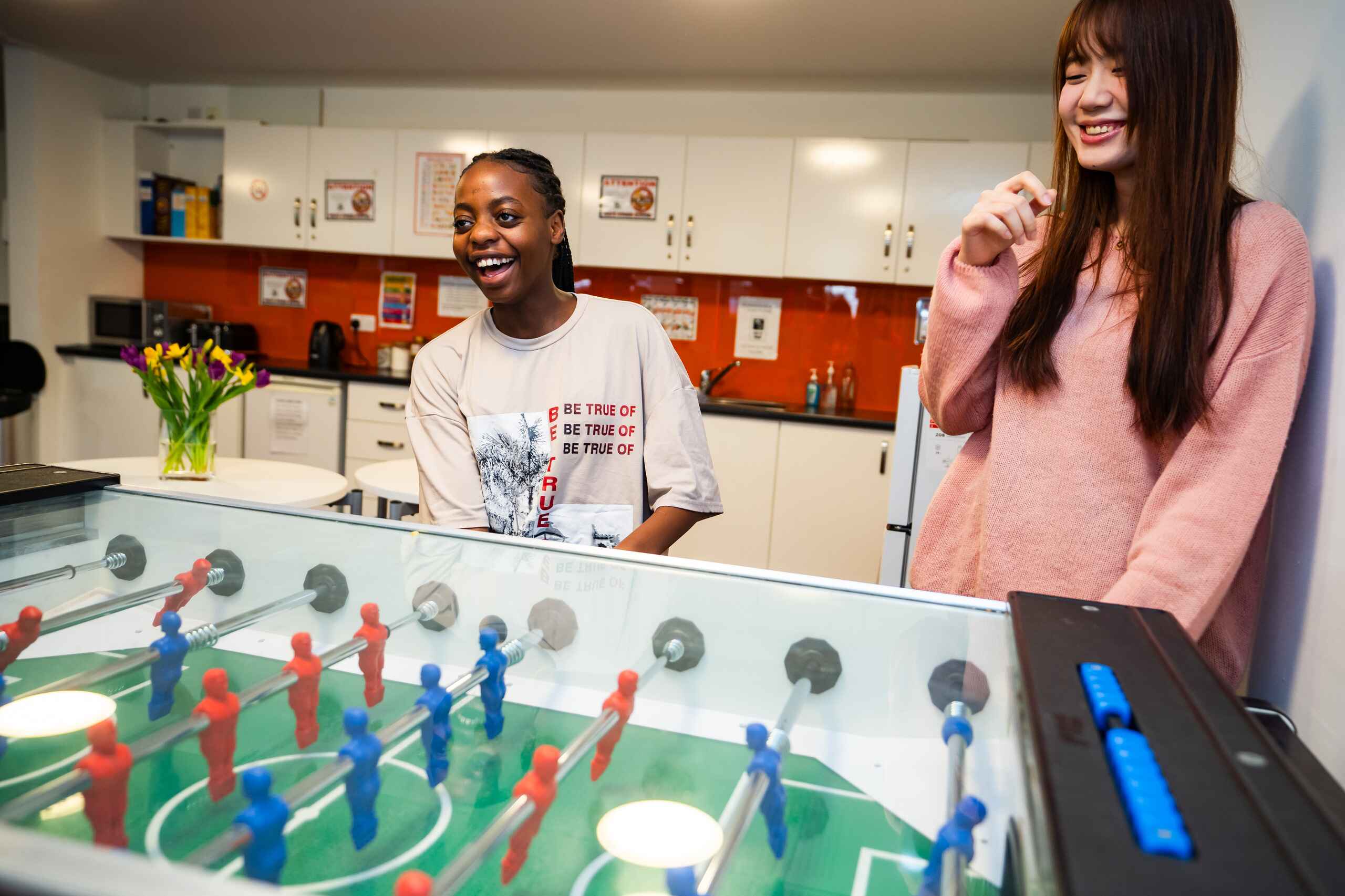 Students Playing Games in Boarding House