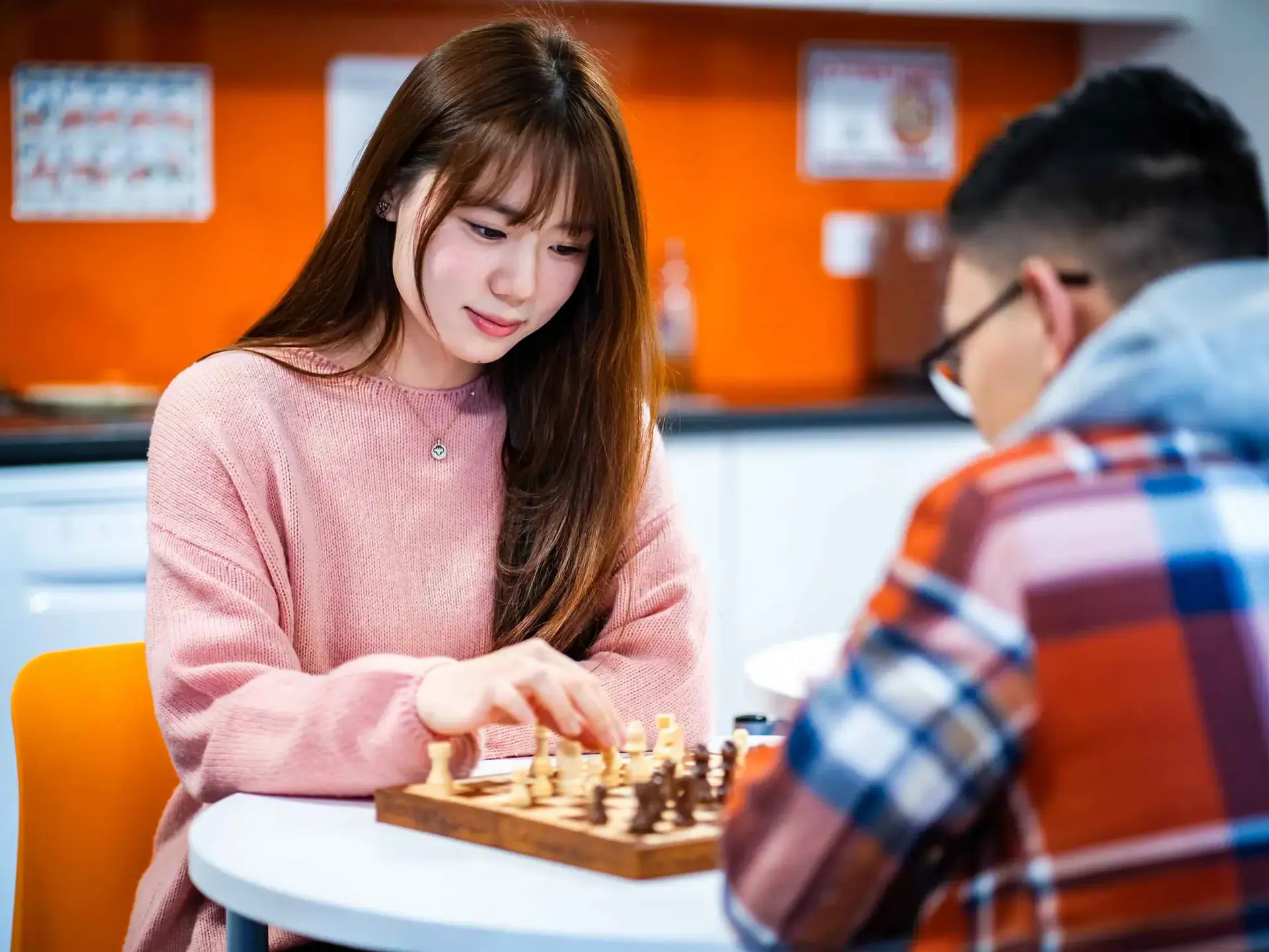 Students playing chess