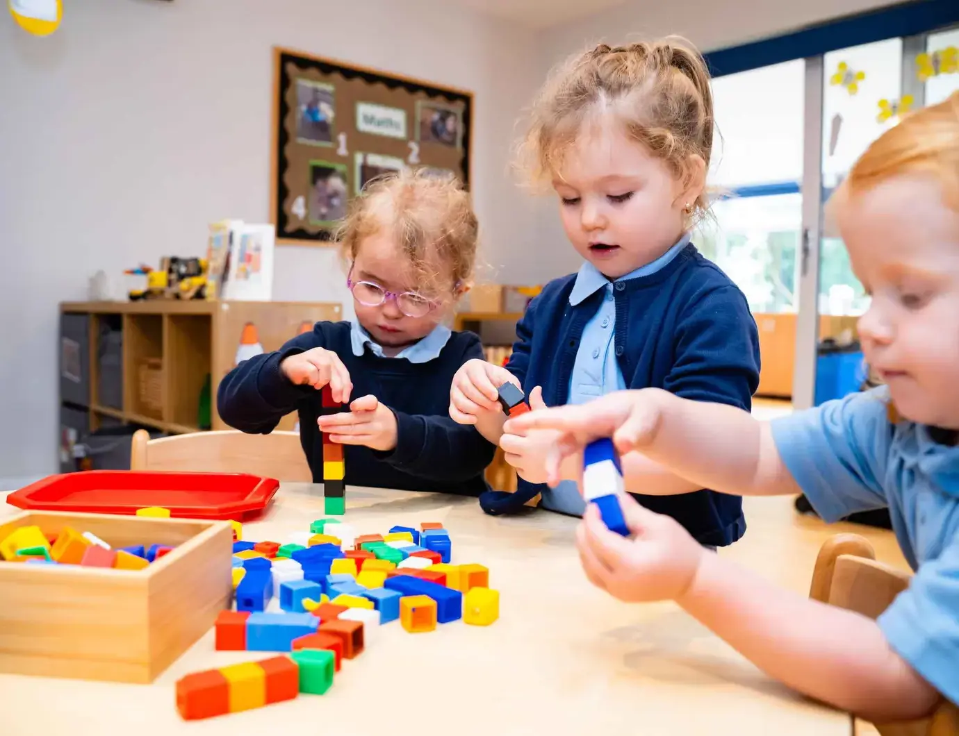 Students playing with blocks