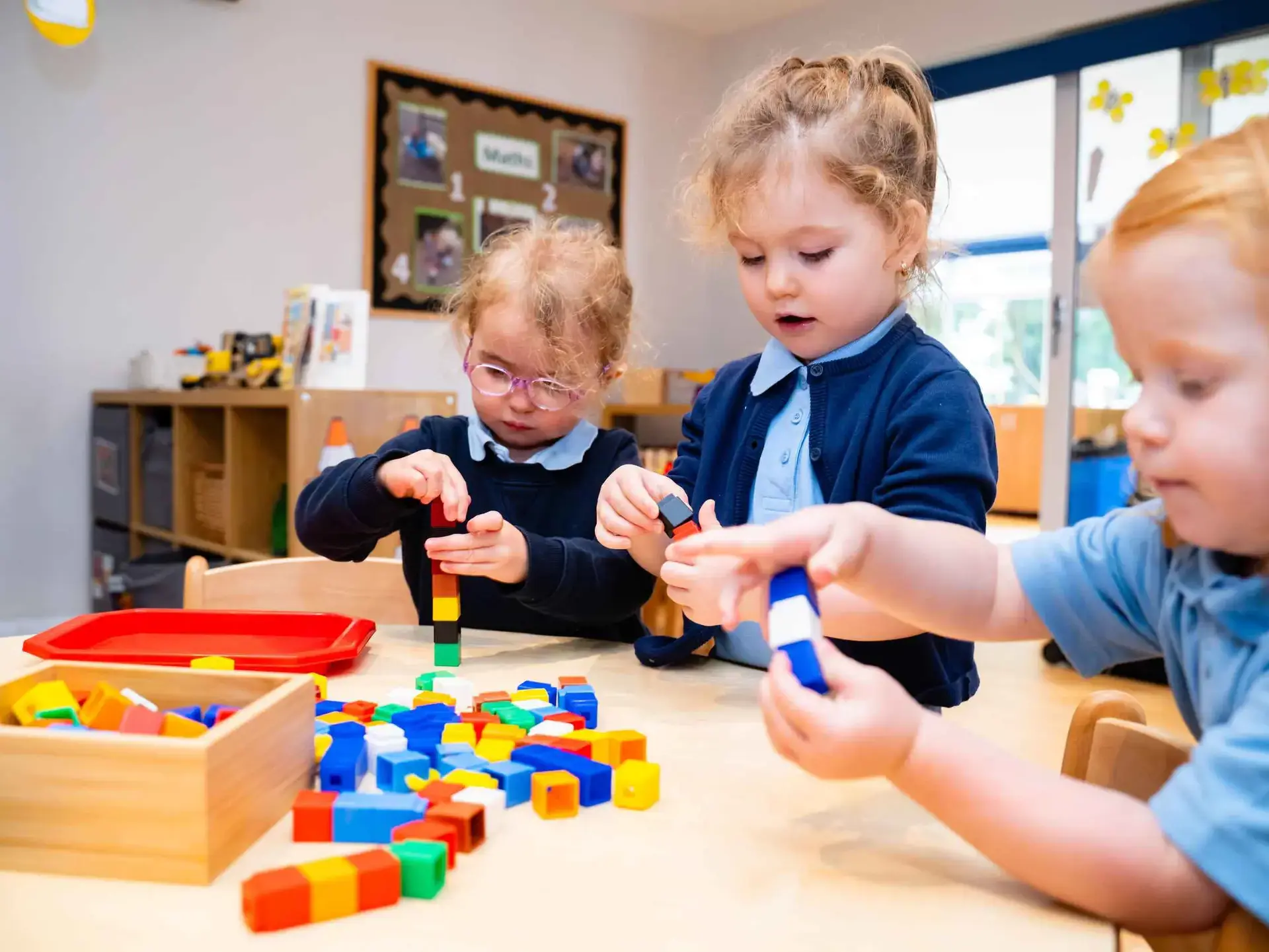 Students playing with blocks