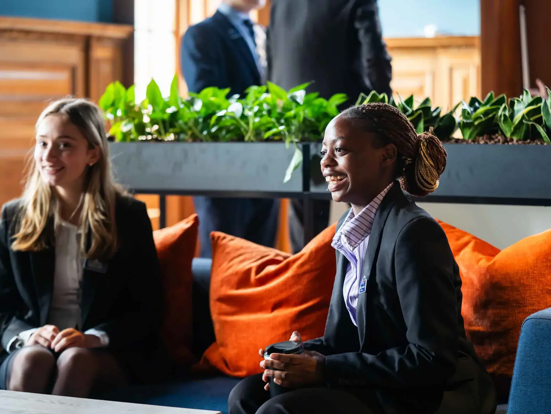 Sixth Formers chatting in lounge