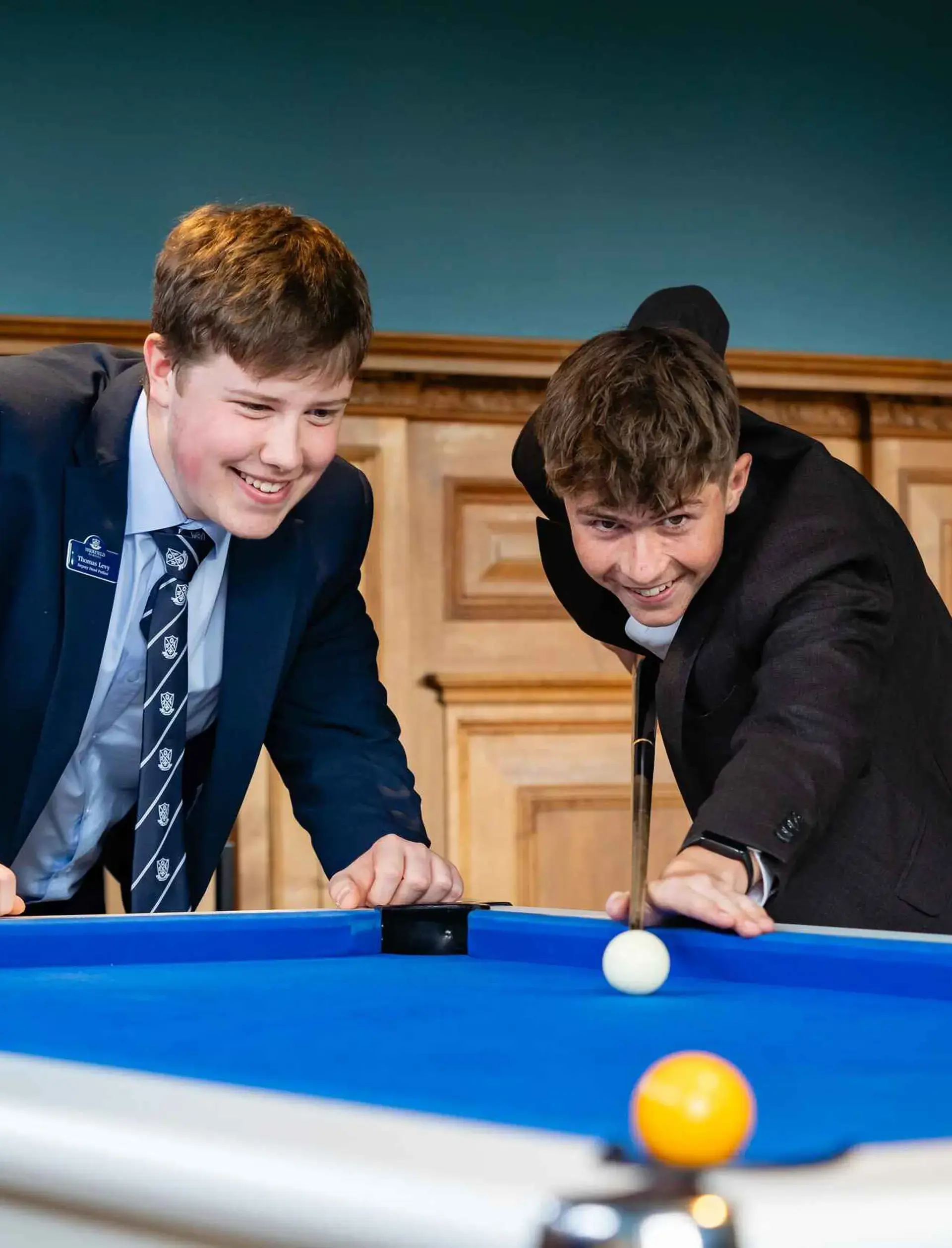 Students playing pool