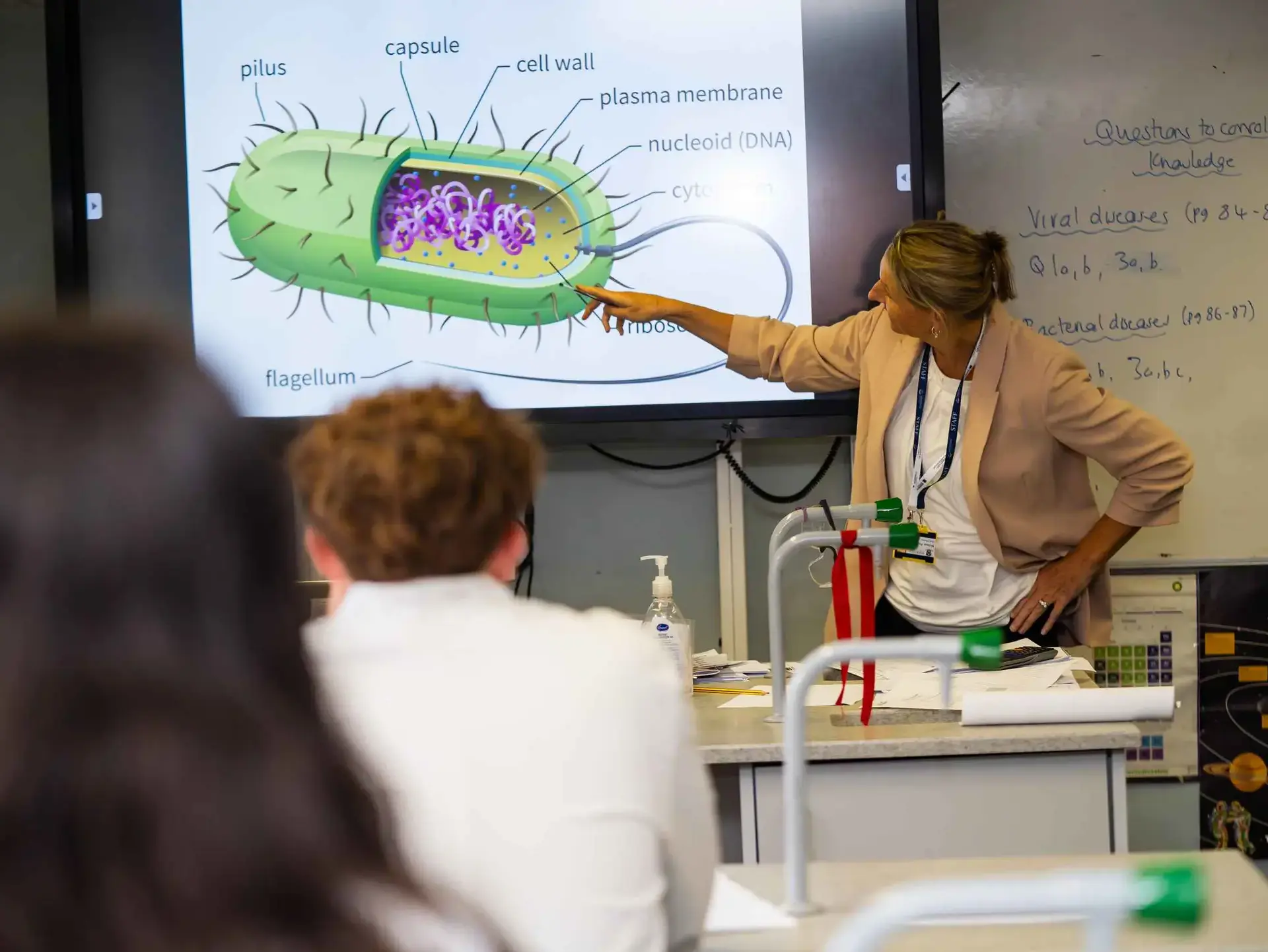 Teacher demonstrating in Science lesson