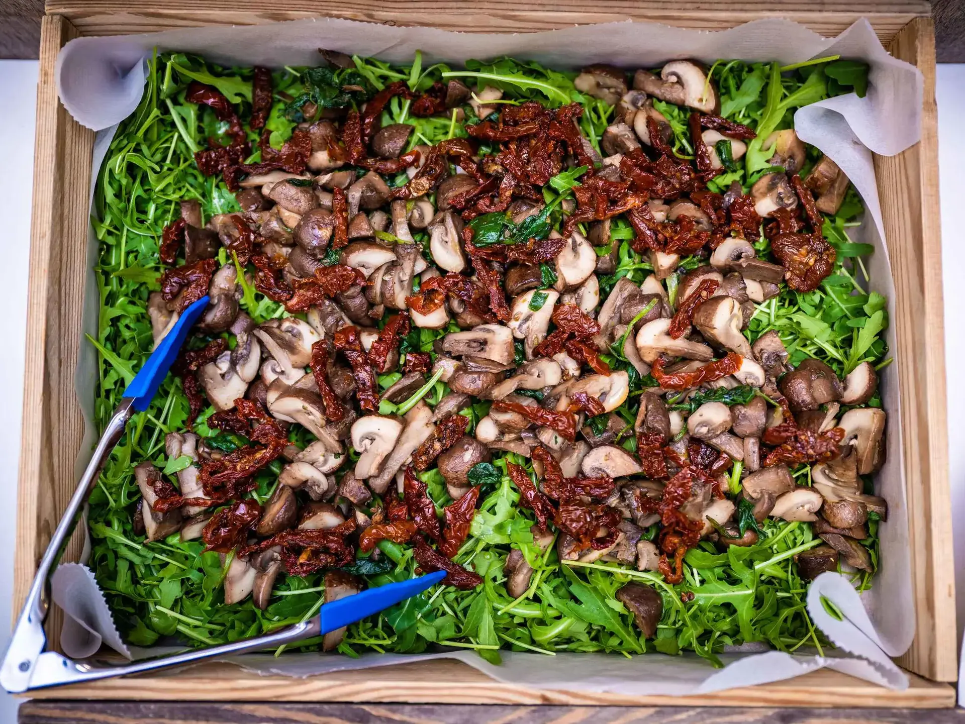 Crate containing a dish of mixed veg