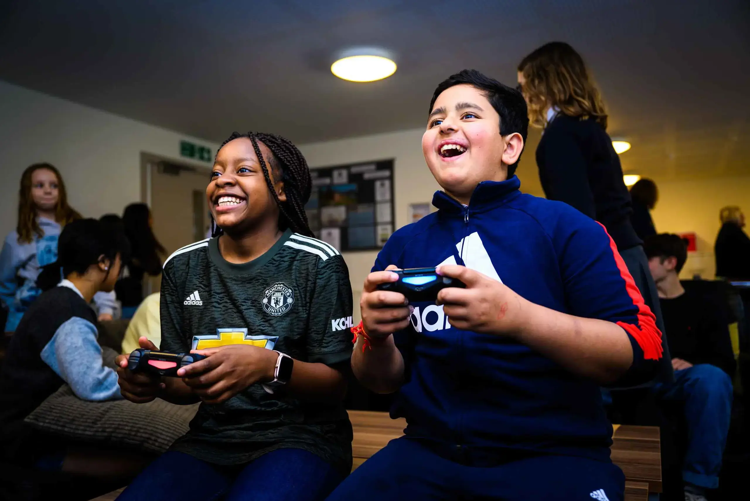 Students playing on games console