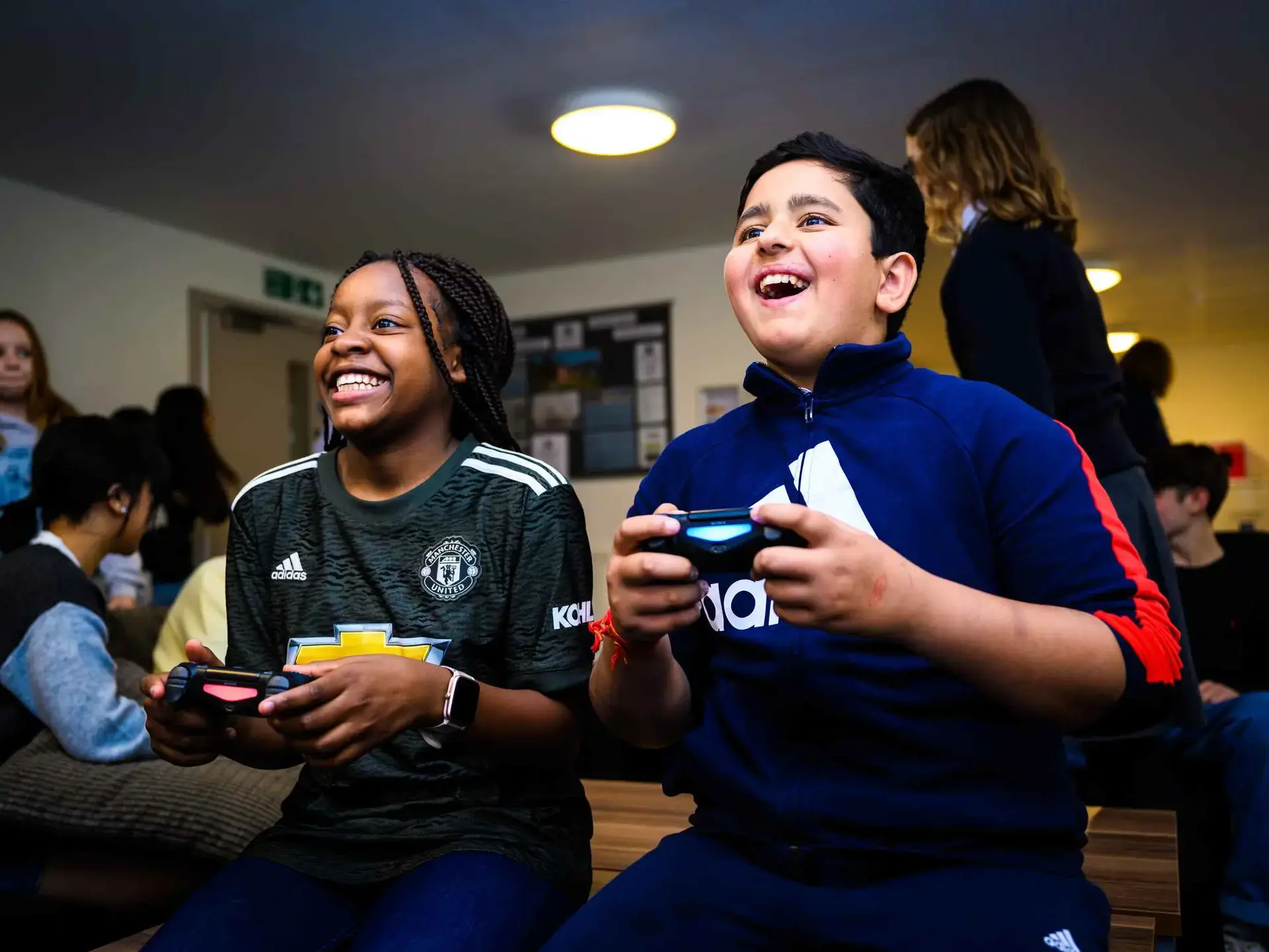 Students playing on games console