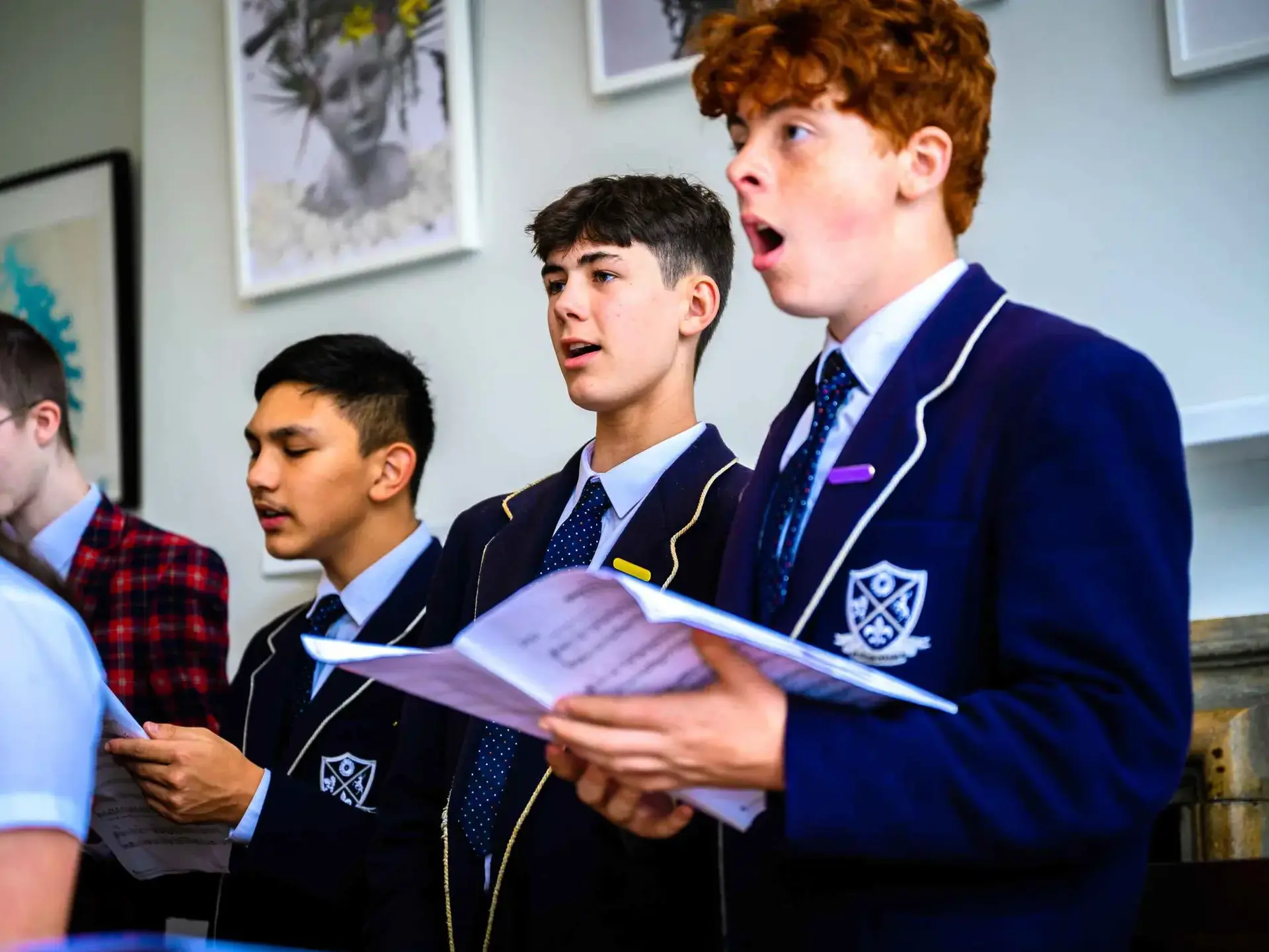 Students singing from sheet music