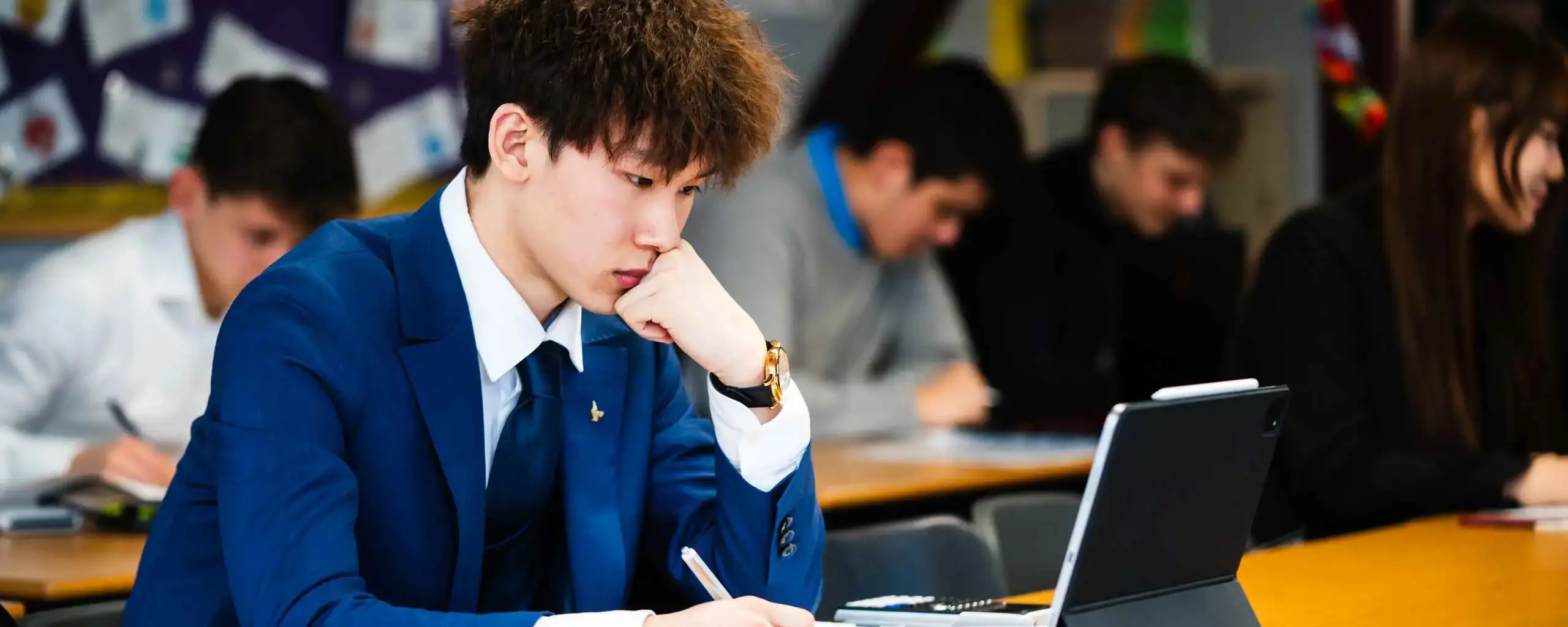 Student in an A Level Maths Lesson