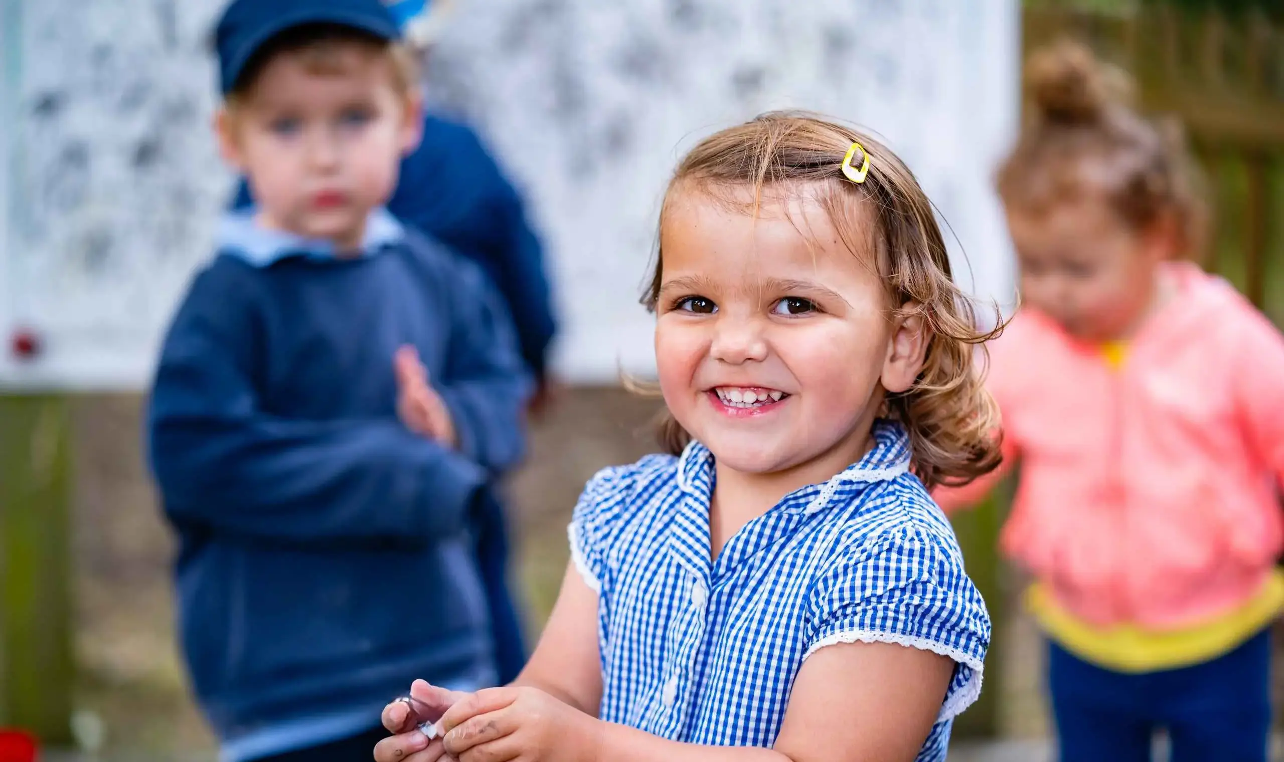 Smiling early years student