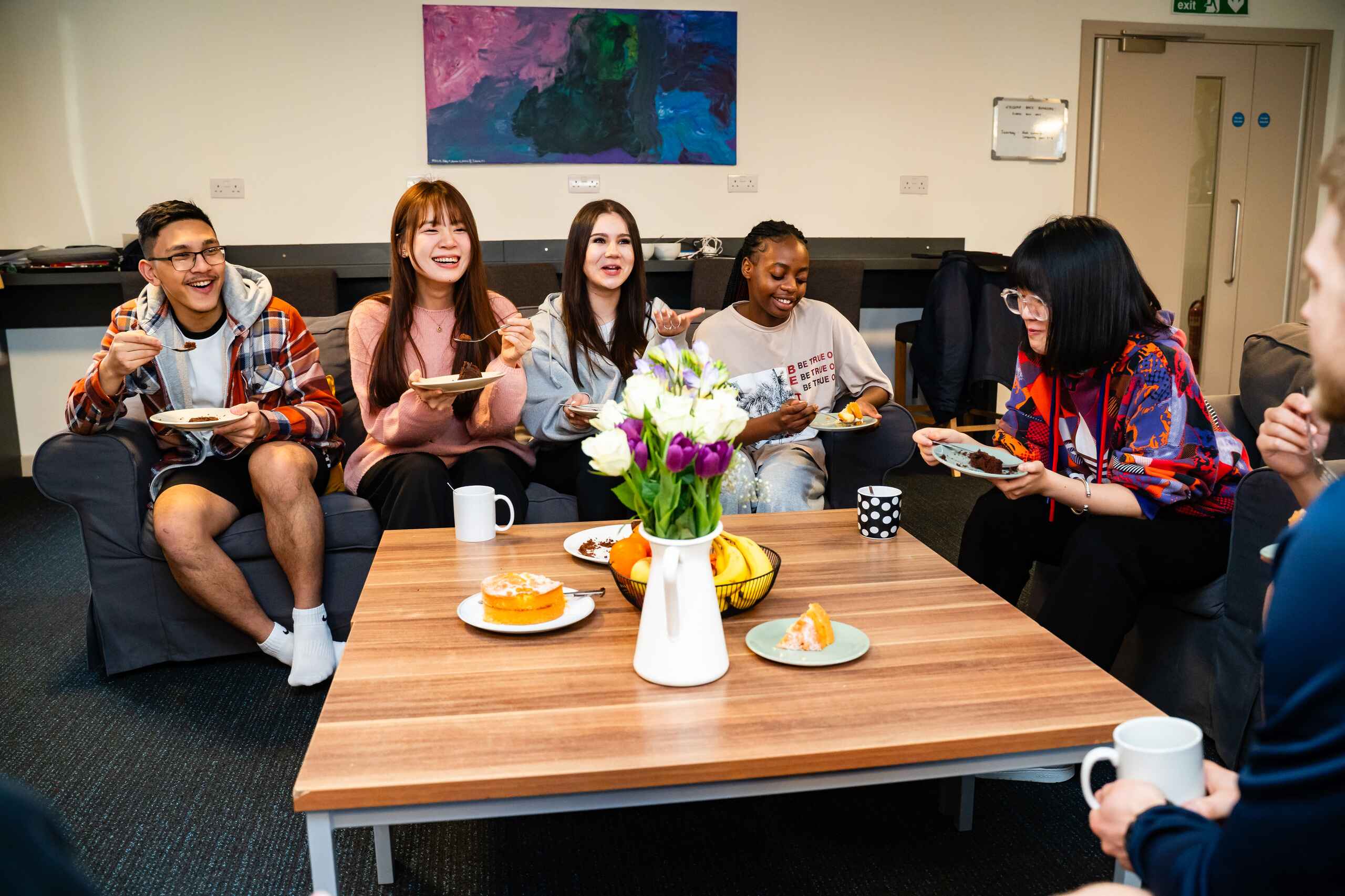 Students Eating and Laughing together