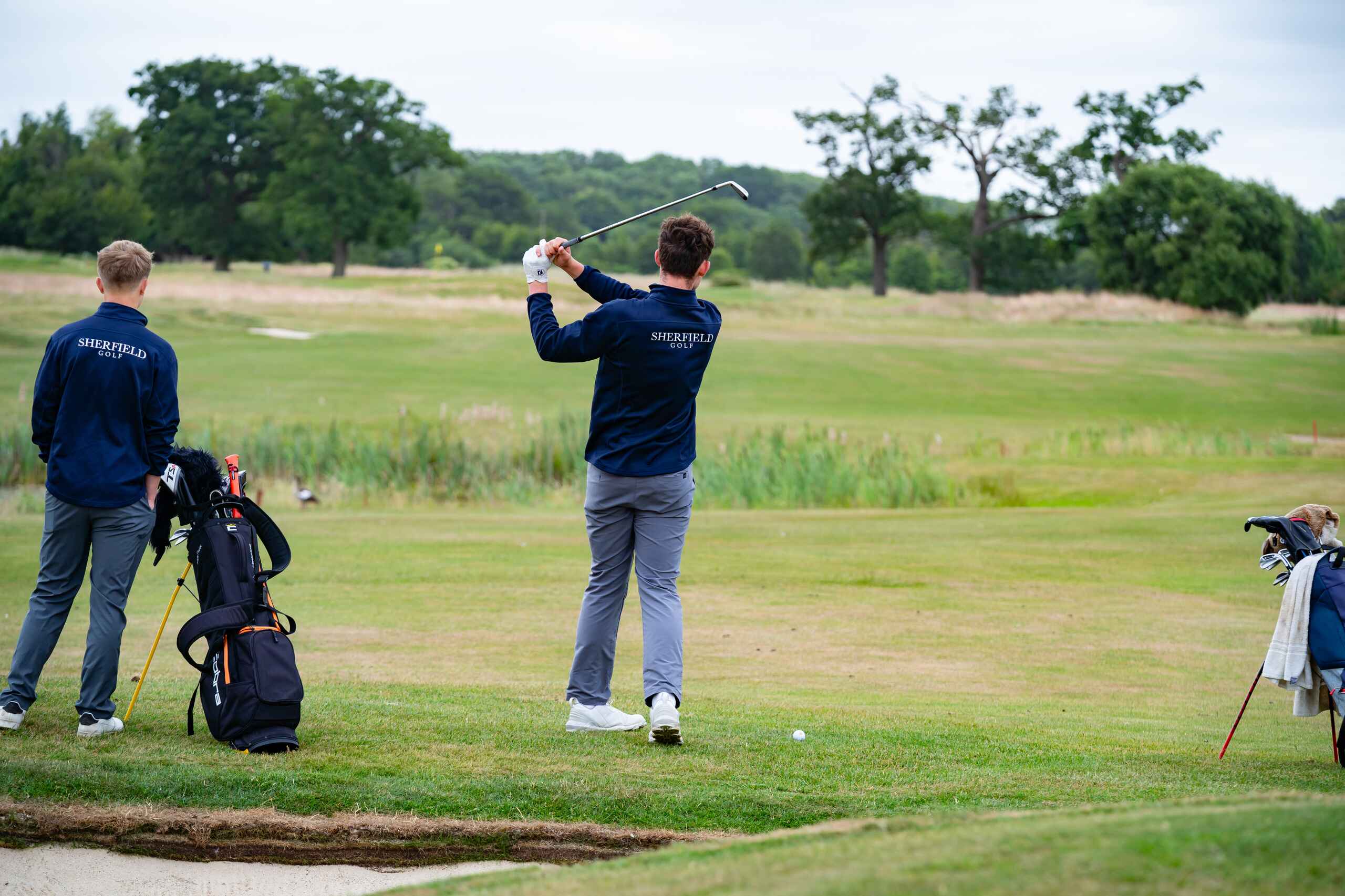 Students playing golf