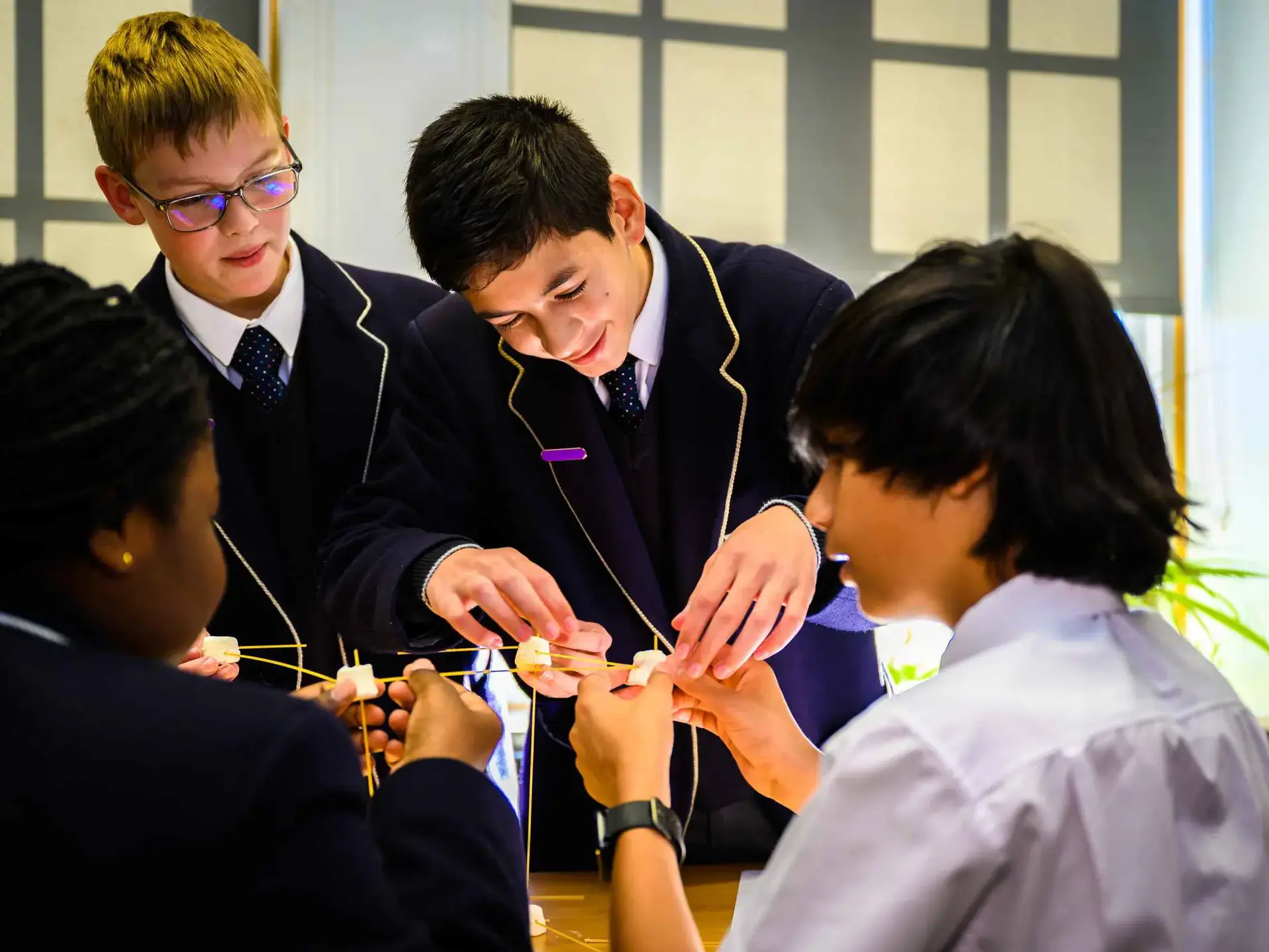 Students carrying out experiment with light