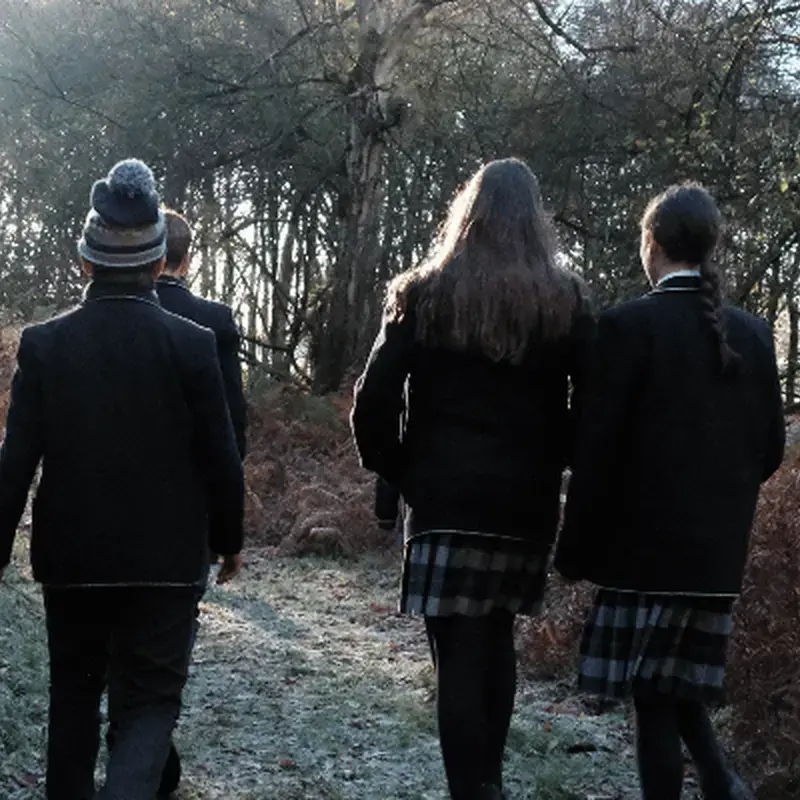 Students walking on winter morning